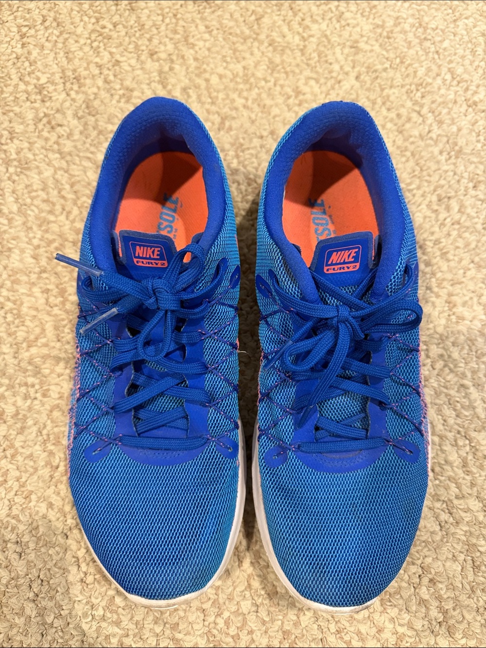Nike Women’s Bright Blue Athletic Sneakers with Orange Accents